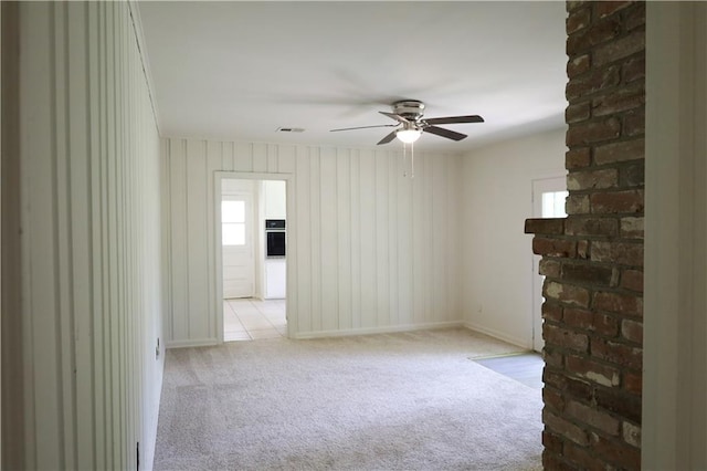 108 N Dr, Covington, LA 70433 - spare room with a ceiling fan, carpet floors, and baseboards