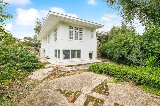 rear view of property with a patio