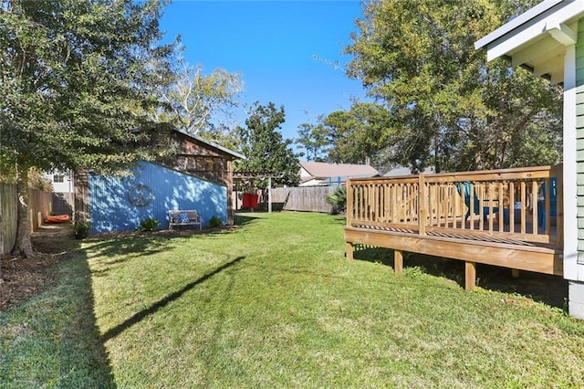 view of yard with a deck