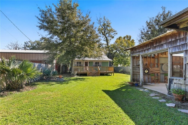 view of yard featuring a deck