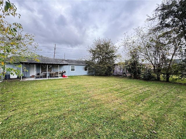 view of yard with a patio area