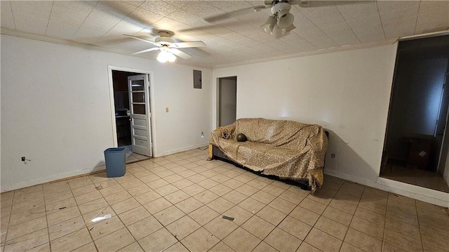 unfurnished room with crown molding, light tile patterned floors, and ceiling fan