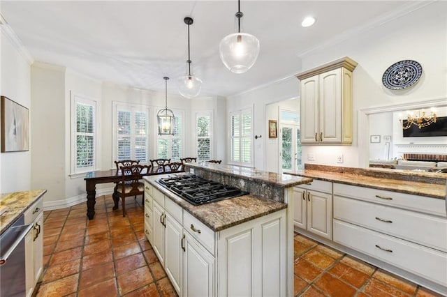 kitchen with stainless steel dishwasher, black gas stovetop, pendant lighting, a kitchen island, and ornamental molding