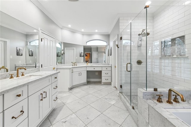 bathroom with vanity, independent shower and bath, and ornamental molding