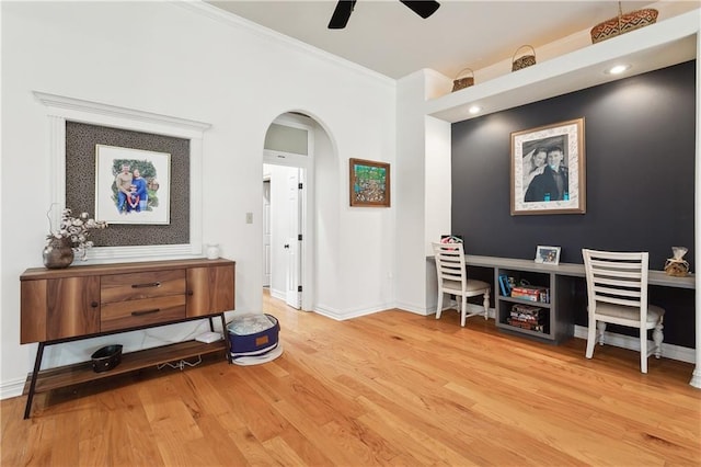 17198 Bridle Path, Hammond, LA 70403 - interior space featuring arched walkways, baseboards, ornamental molding, and wood finished floors