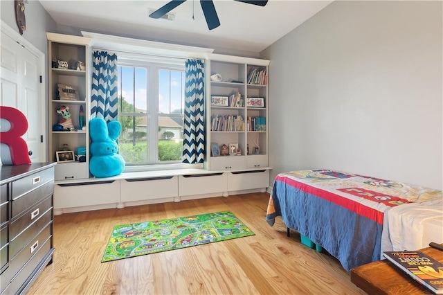 17198 Bridle Path, Hammond, LA 70403 - bedroom with light wood-style flooring and ceiling fan