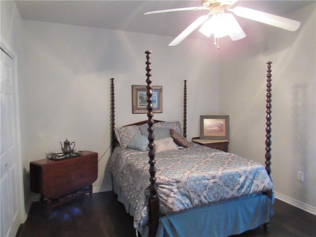 bedroom featuring ceiling fan and dark wood-type flooring