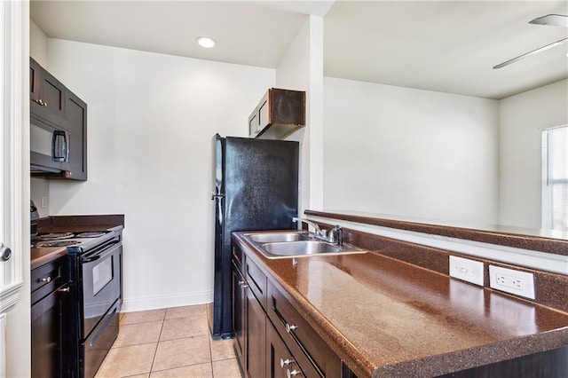 kitchen featuring dark brown cabinets, ceiling fan, sink, black appliances, and light tile patterned flooring