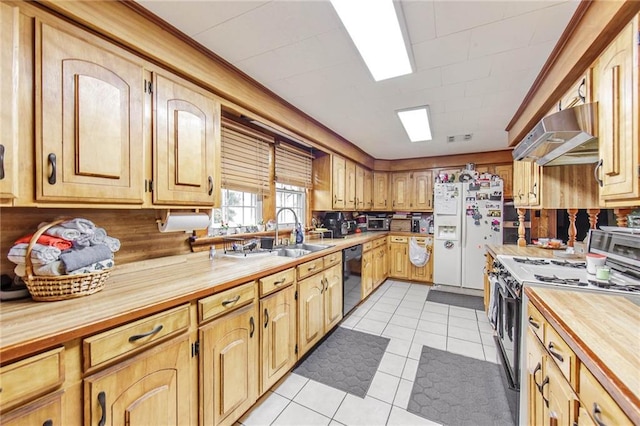 kitchen featuring sink, stainless steel stove, white refrigerator with ice dispenser, ventilation hood, and light tile patterned floors