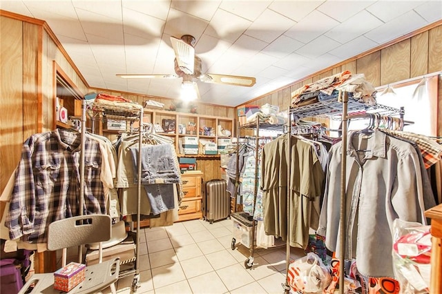 walk in closet with ceiling fan and light tile patterned floors