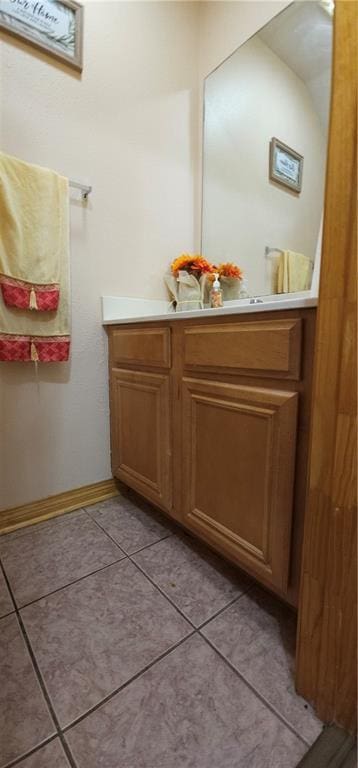 bathroom featuring tile patterned floors and vanity