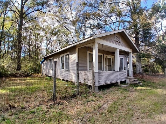 view of front of home featuring covered porch