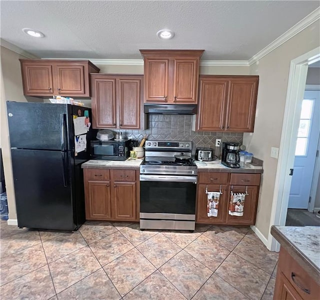 kitchen featuring light tile patterned floors, tasteful backsplash, ornamental molding, and black appliances