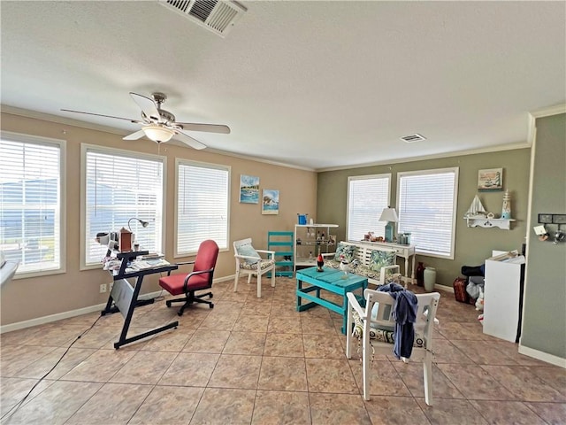 playroom featuring ceiling fan, light tile patterned floors, and ornamental molding