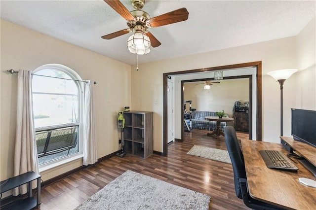 office with dark wood-type flooring