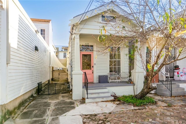 doorway to property with covered porch