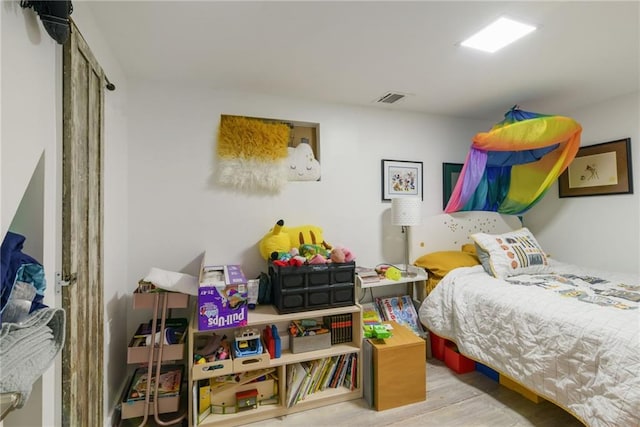 bedroom featuring light hardwood / wood-style flooring