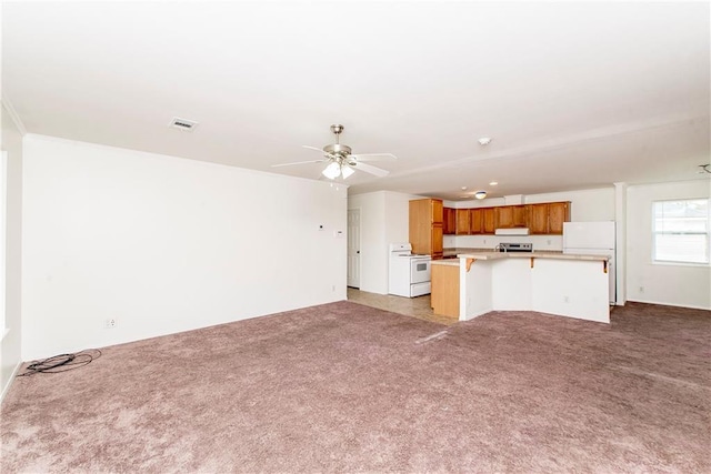 unfurnished living room with light carpet and ceiling fan