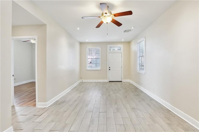 foyer featuring light hardwood / wood-style floors and ceiling fan