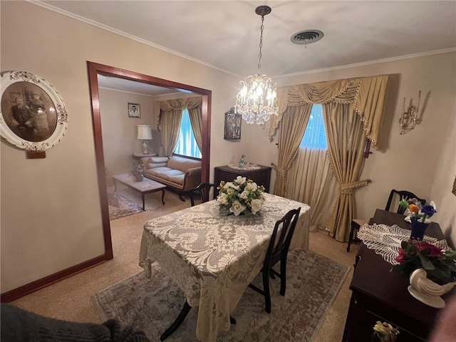 carpeted dining space featuring an inviting chandelier and crown molding