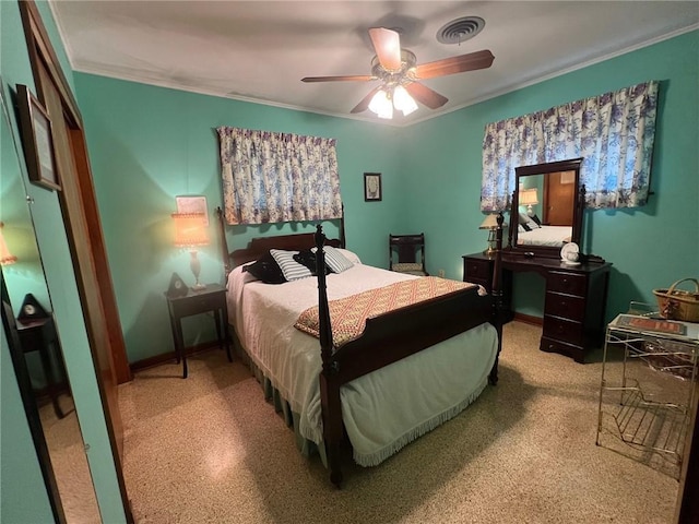 bedroom featuring ceiling fan and ornamental molding