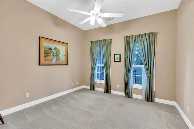 carpeted empty room with ceiling fan