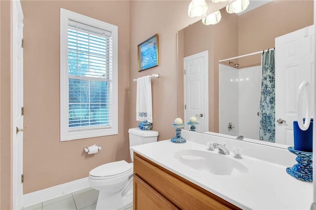 bathroom with tile patterned flooring, vanity, curtained shower, and toilet