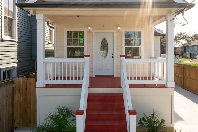 entrance to property with covered porch