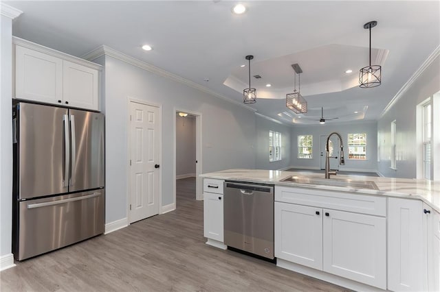 kitchen featuring ceiling fan, white cabinetry, sink, and appliances with stainless steel finishes