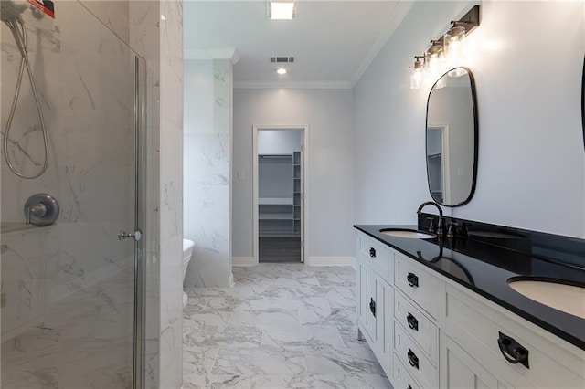 bathroom with tiled shower, vanity, and ornamental molding