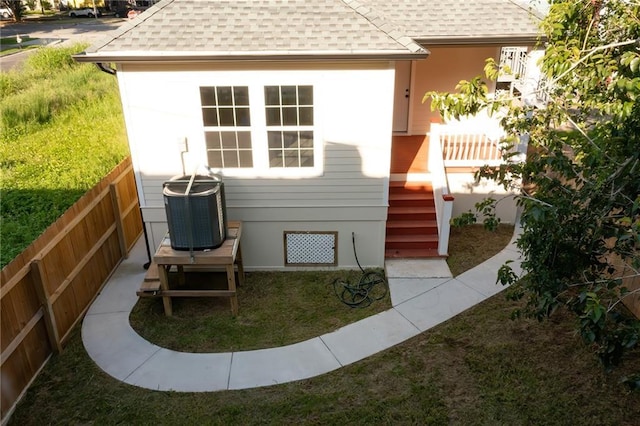 view of outdoor structure with central AC