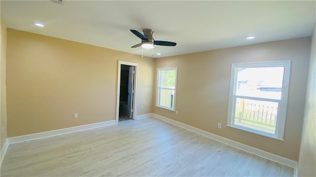 unfurnished bedroom with light hardwood / wood-style floors and ceiling fan