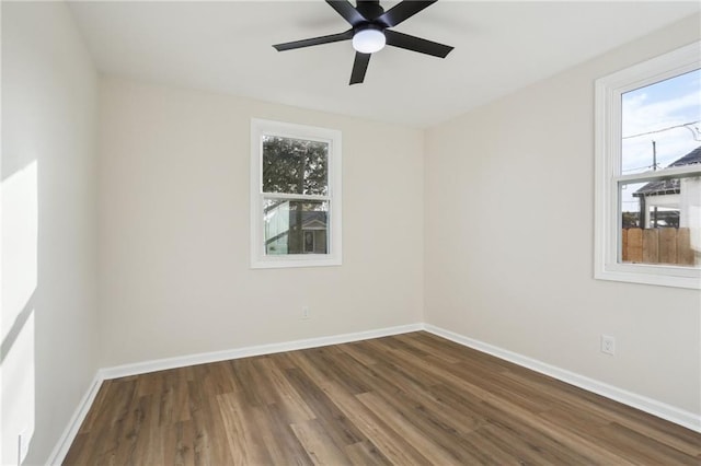 unfurnished room featuring hardwood / wood-style floors and ceiling fan