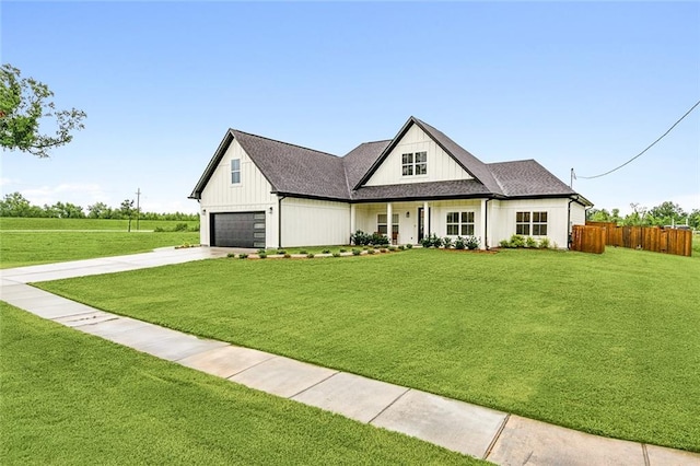 modern farmhouse with a garage and a front yard