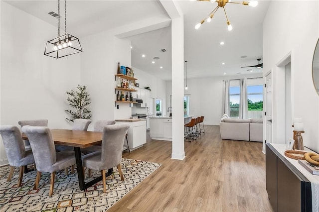 dining room with light wood-type flooring