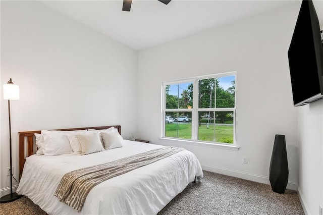 bedroom featuring ceiling fan and carpet flooring