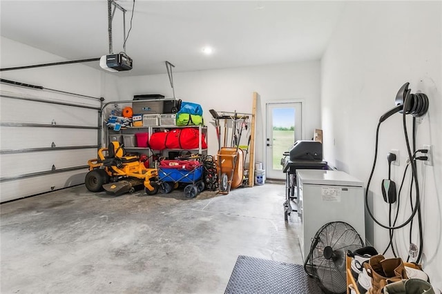 garage featuring a garage door opener