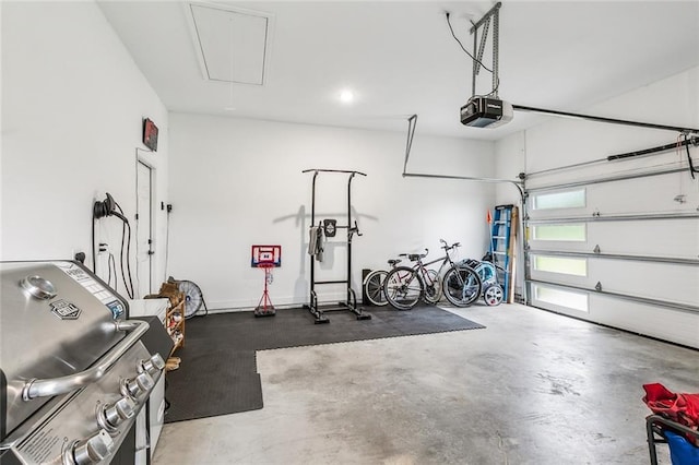 garage featuring a garage door opener