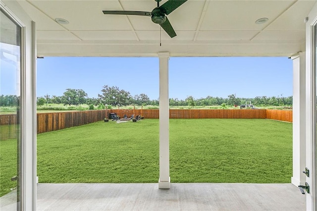 view of yard featuring ceiling fan