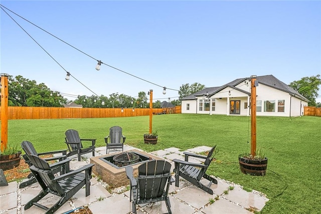 view of patio with an outdoor fire pit