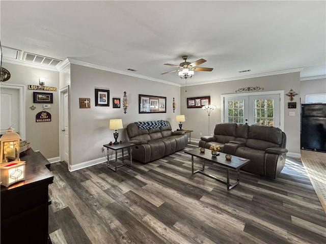 living room with ceiling fan, ornamental molding, dark wood-type flooring, and french doors