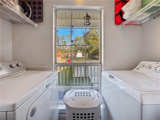 laundry room with washer and dryer