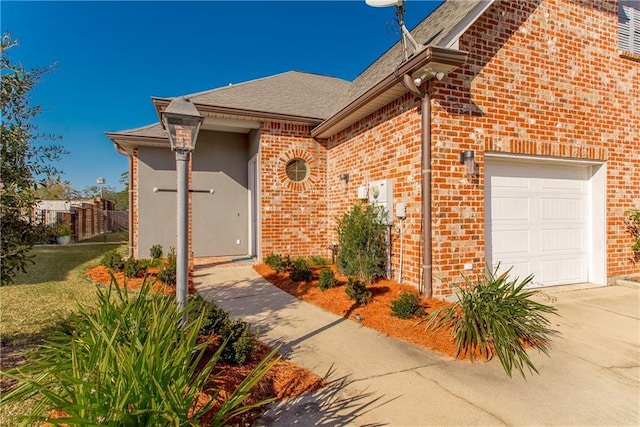 doorway to property featuring a garage