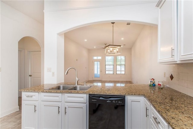 kitchen with kitchen peninsula, white cabinetry, sink, and black dishwasher