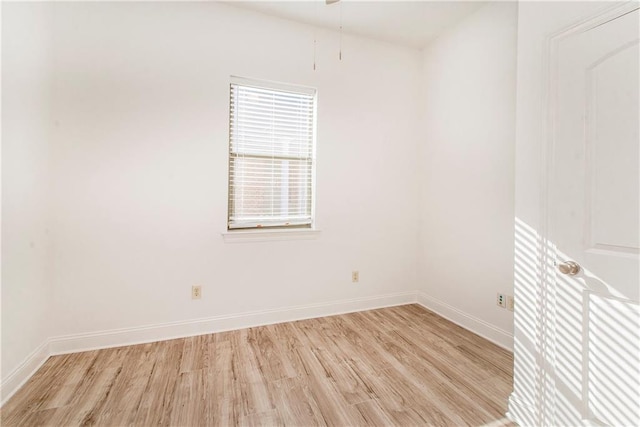 unfurnished room featuring light hardwood / wood-style floors