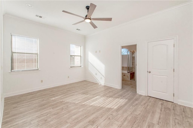 unfurnished room featuring light hardwood / wood-style floors, ceiling fan, and ornamental molding