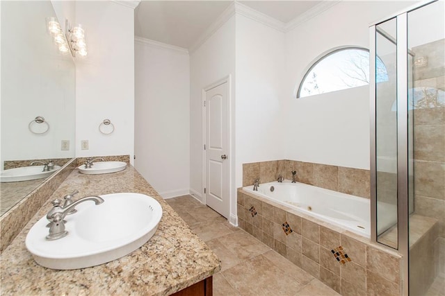 bathroom featuring tile patterned flooring, vanity, and crown molding