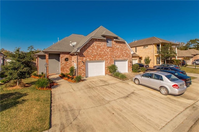 view of front facade with a front lawn and a garage