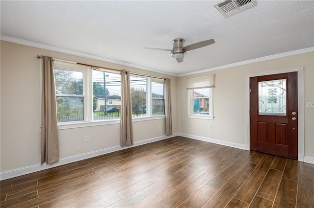 2501 Sage St, New Orleans, LA 70122 - foyer featuring dark wood finished floors, visible vents, a ceiling fan, and baseboards