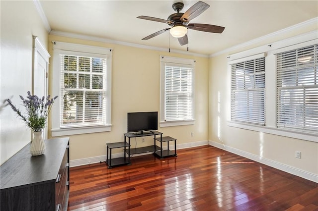 living room featuring crown molding, dark wood-type flooring, and ceiling fan